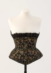 Corset noir baleiné en soie tissée, avec de minuscules fleurs bleues et roses, années 1890